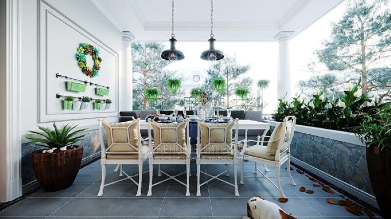 Bố trí không gian ăn uống ngoài trời đẹp mắt với hệ thống cây xanh tươi mát cùng bộ bàn ghế ăn êm ái. thiết kế biệt thự