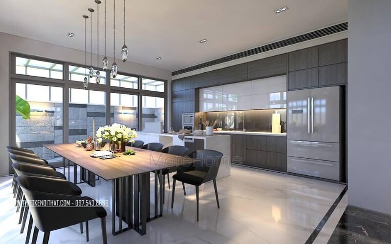 Bàn ghế ăn hiện đại đẹp sang trọng với sự kết nối đồng điệu giữa chiếc bàn gỗ chân sắt sang trọng cùng bộ 8 ghế sẫm màu. thiết kế biệt thự