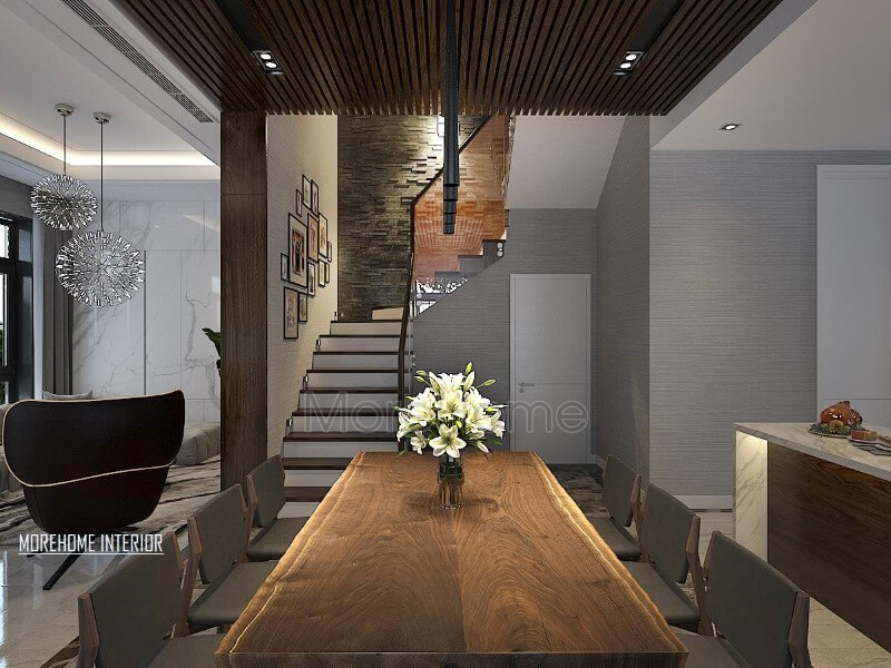 Bàn ăn gỗ óc chó nguyên tấm ấn tượng với đường đối vân độc đáo cùng gamsắc} trầm sang trọng đang trở thành xu hướng thiết kế phòng ăn ấn tượng nhất hiện nay. thiết kế biệt thự